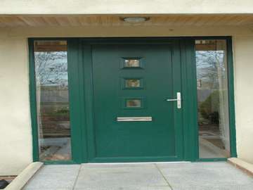 Mr S, Chester: Installation of double diamond front door with middle strip glazing and side panel windows in 28mm double glazing.